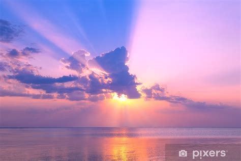 Wall Mural Beautiful pink sunset over sea - PIXERS.US