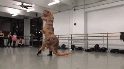 This viral video of a guy in the giant T-Rex costume dancing in "A Chorus Line" may be the best ...