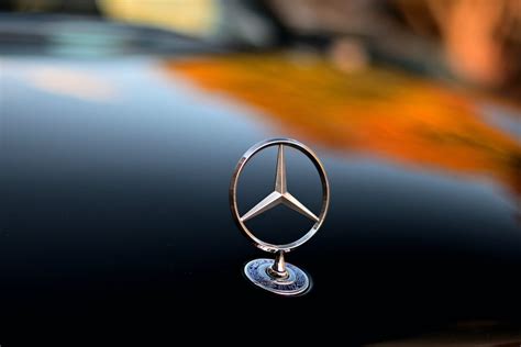 Silver Mercedes Benz Emblem in Close Up Photography · Free Stock Photo