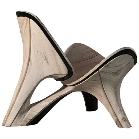 The 'Wegner' reinterpreted Lapella Marble Chair - Design Zaha Hadid ...