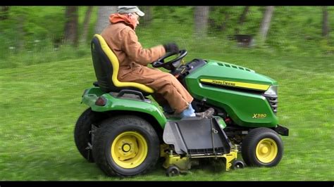 2015 X590 John Deere Lawn Tractor CUTTING and Mowing GRASS - YouTube