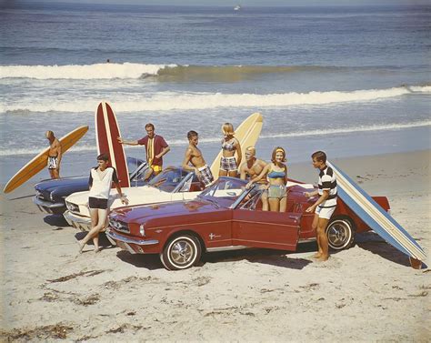 Friends with surfboards in car on beach by Tom Kelley Archive | Vintage ...