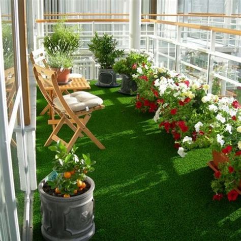 Artificial grass in the balcony. - The Golden Window Designs