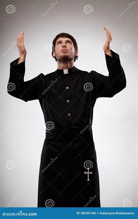 Priest Raising Hands And Praying Stock Photo - Image: 38595140