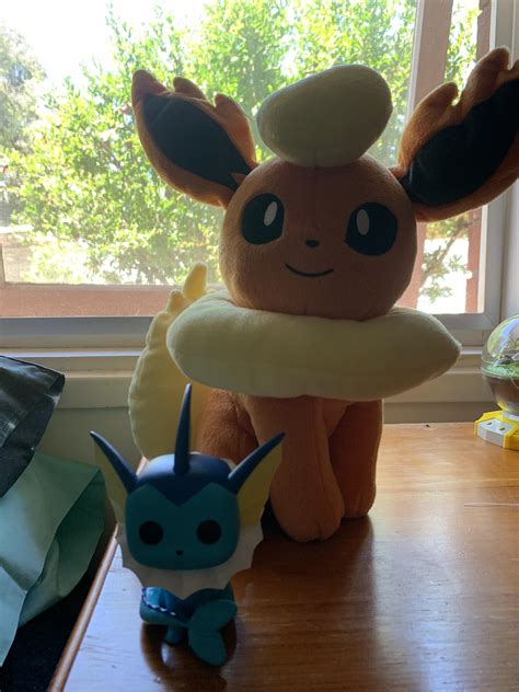 Got my two favourite Pokémon! flareon plush and vaporeon pop figure ...