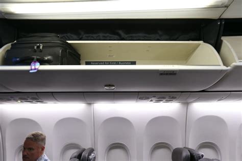 Airline Overhead Storage Bin Etiquette Guide: Which Compartments Are ...