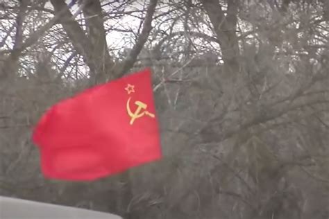 Video: Russian troops brandishing Soviet flag in Ukraine