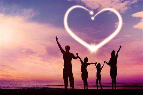 Premium Photo | Silhouette of happy family with heart symbol