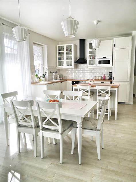 Kitchen Dining Room with White Cabinets