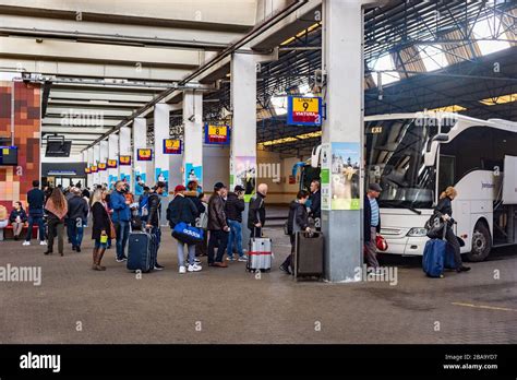 Lisbon, Portugal - 3 March 2020: Sete Rios Bus Terminal Station. People boarding a bus Stock ...