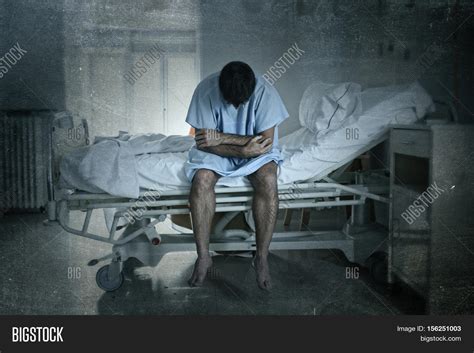 Young Desperate Man Sitting Image & Photo | Bigstock