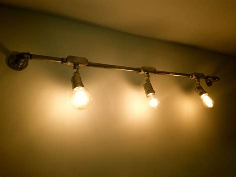 track lighting shown with 3 different size bulbs | Industrial track ...