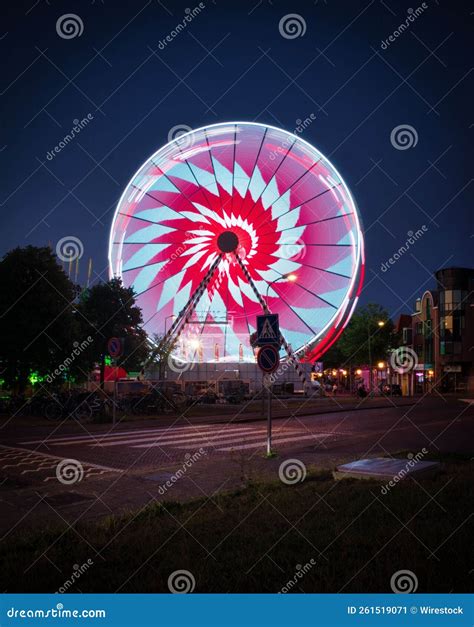 Vertical Shot of a the Big Booster at Night at Funfair Hoorn, the ...