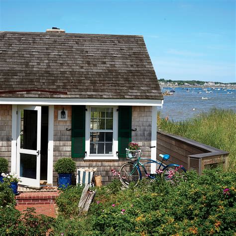 This charming 1930s cottage has all of the classic Cape Cod elements like cedar shingles and ...