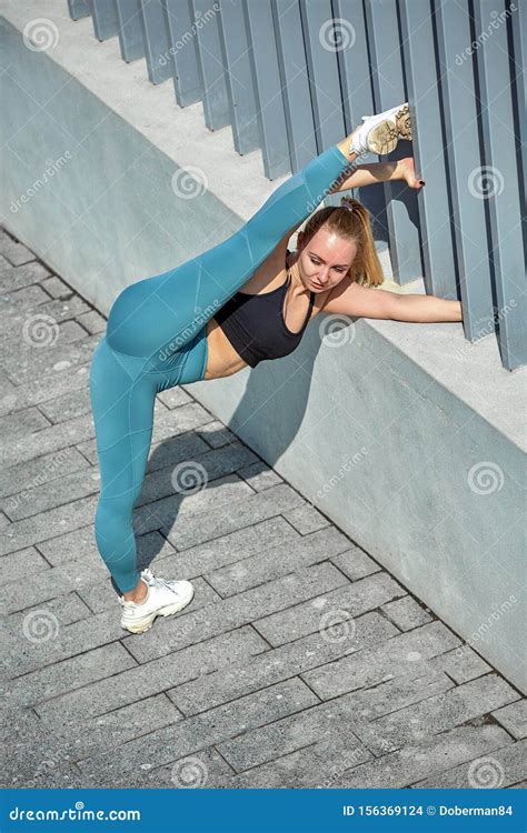 Beautiful Athletic Young Girl in Sportswear, Doing Exercises for ...