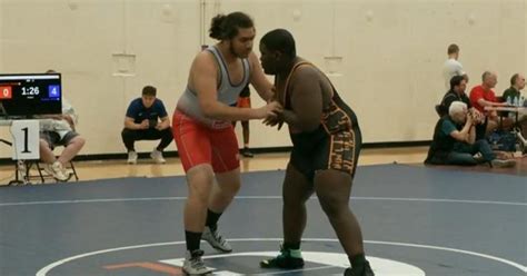 Youth wrestling program teaches kids skills on and off the mat - CBS News