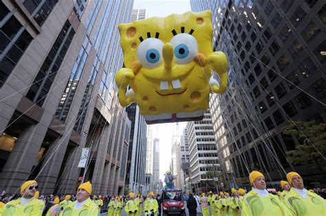 High-flying balloon characters star in Thanksgiving parade | PBS NewsHour