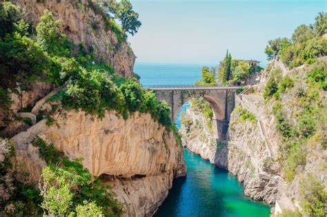 Premium Photo | Famous fiordo di furore beach seen from bridge.