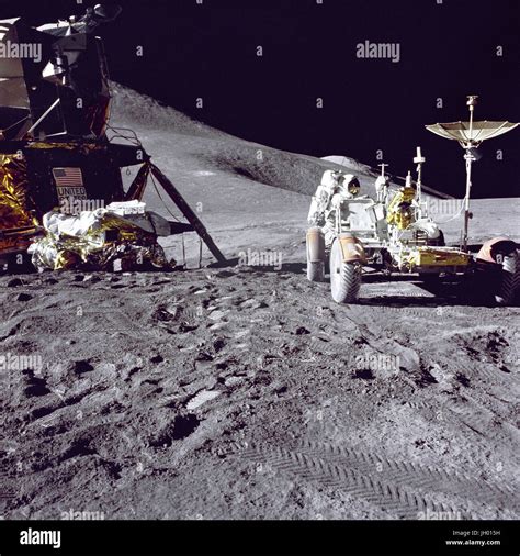 Apollo 15 Lunar Module pilot James B. Irwin loads-up the "Rover", Lunar ...