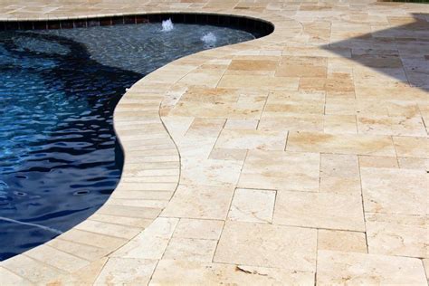 Pool Decks | Legacy Custom Pavers | Travertine pool decking, Concrete ...