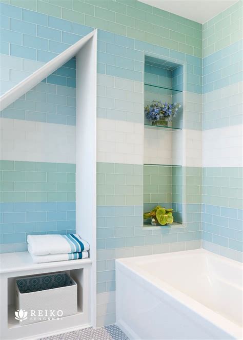 We designed this beach house bath using matte glass tile that resemble ...