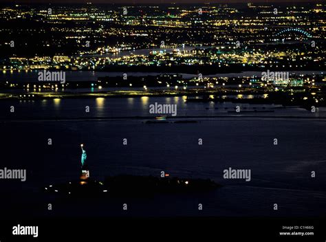 United States, New York City, Liberty Island and the lights of New Jersey Stock Photo - Alamy