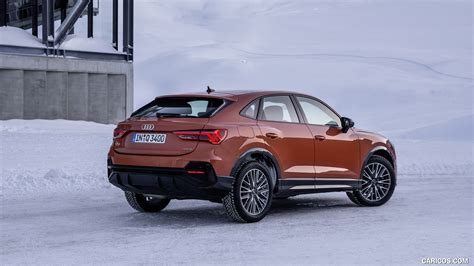 Audi Q3 Sportback | 2020MY (Color: Pulse Orange) | Rear Three-Quarter