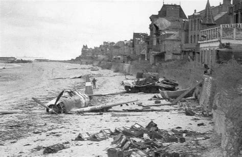 Then and Now. A crashed U.S. fighter plane on the waterfront some time ...