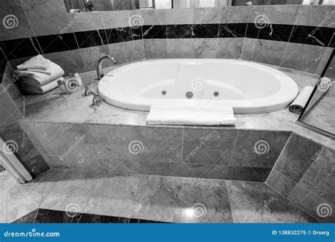 White Jacuzzi Bathtub Decorated with Marble Tiles Stock Image - Image of design, bowl: 138832275