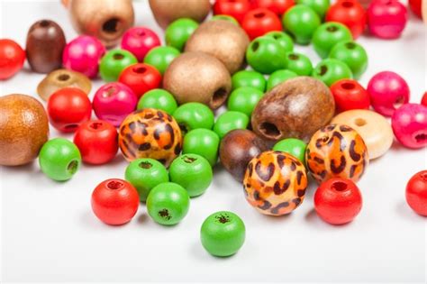 Premium Photo | Many painted wooden round beads