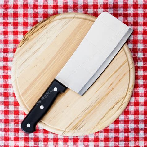 Cleaver on wooden chopping board — Stock Photo © igordutina #5048852