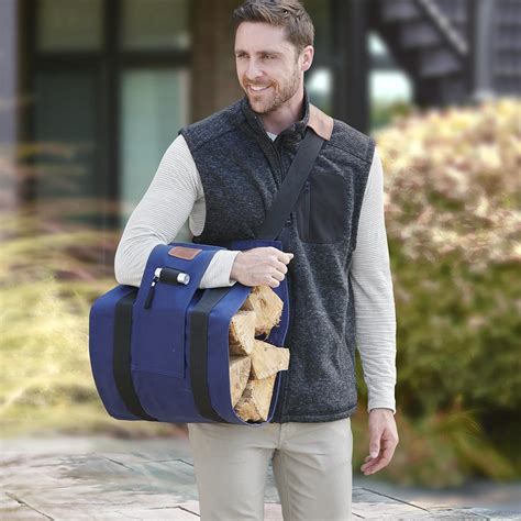 The Easy Loading Ergonomic Firewood Tote - Hammacher Schlemmer