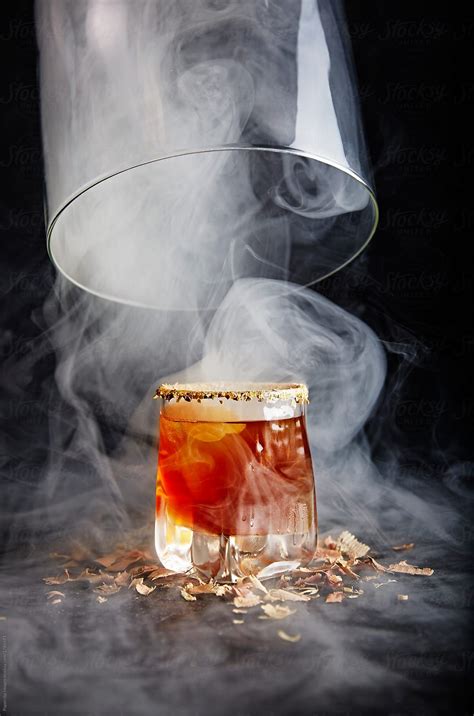 "Smoked Whiskey" by Stocksy Contributor "Paperclip" | Smoked whiskey, Smoked cocktails, Cocktails