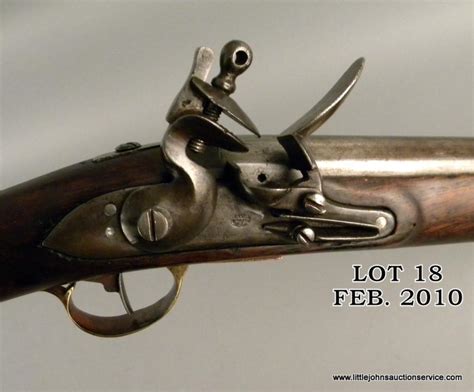 Flintlock musketoon or carbine in British style for colonial forces. Shows Arabic or Persian cartouc