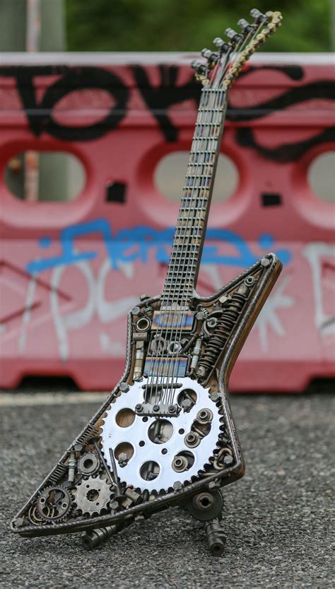 guitar art, metal guitars, heavy metal, welded guitars, lemmy, dimebag ...