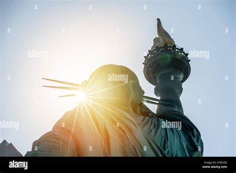 New York; statue of liberty in the sunset Stock Photo - Alamy