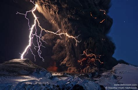 Lightning over the volcano and jeeps parked on the lava: Photographer's ...