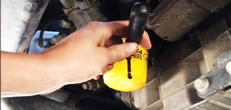 How to Get Oil Filter Off With Screwdriver - Up Tools Down