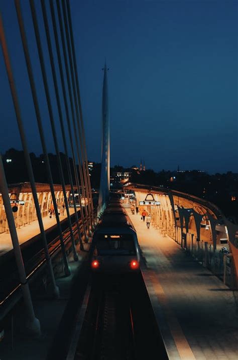 Illuminated Train Platform During Night Time · Free Stock Photo