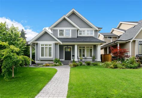 Gray House with stone path - Accord Group