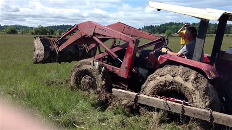 Tractor stuck in mud solution - YouTube