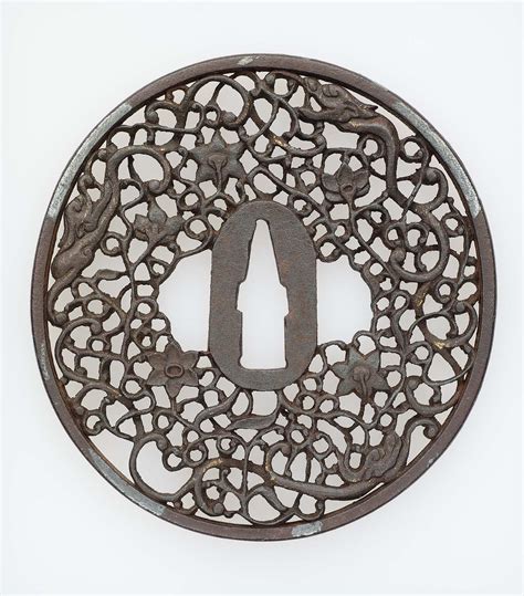 Tsuba with design of dragons and foliage | Museum of Fine Arts, Boston