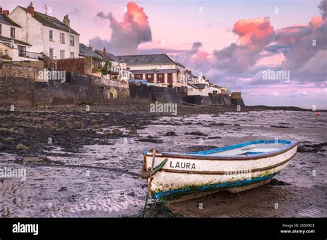 Coastal properties viewed from the River Torridge estuary at low tide ...