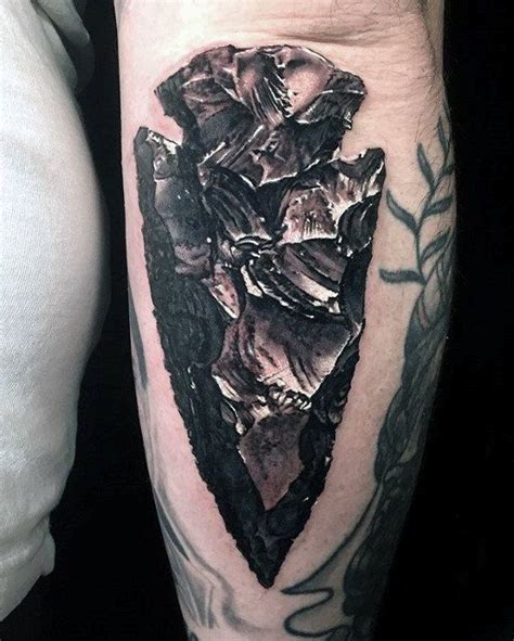 real arrowhead | Hyper realistic tattoo, Arrow head tattoos, Headdress tattoo