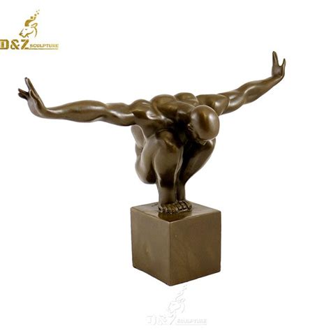 Olympic man with arms stretched out bronze statue