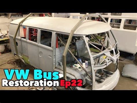 an old bus that is being restored in a garage with the words vw bus restoration p