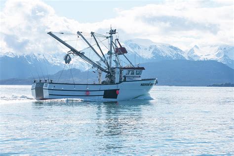 Commerical Fishing Boat departing te inlet at Homer Spit, Alaska Photograph by Timothy Wildey ...