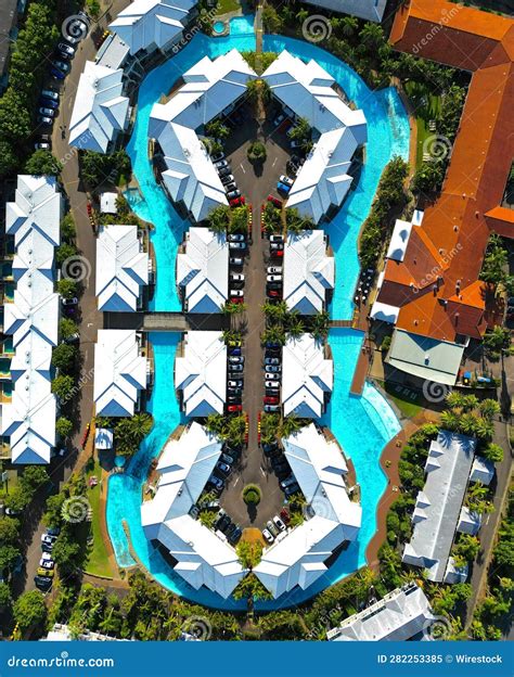 Aerial View of a Beach Resort with Swimming Pool and Multiple Buildings Stock Image - Image of ...