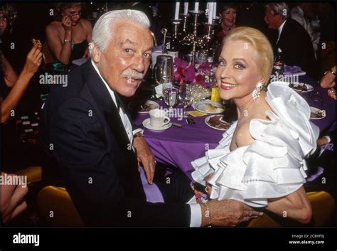 Cesar Romero and wife attending the Thalians Ball in Beverly Hills, CA ...