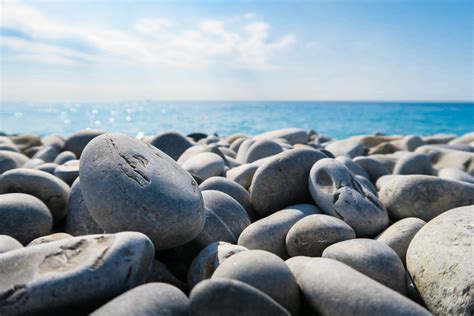 Free Images : beach, sea, coast, sand, rock, ocean, shore, pebble, blue, material, stones ...